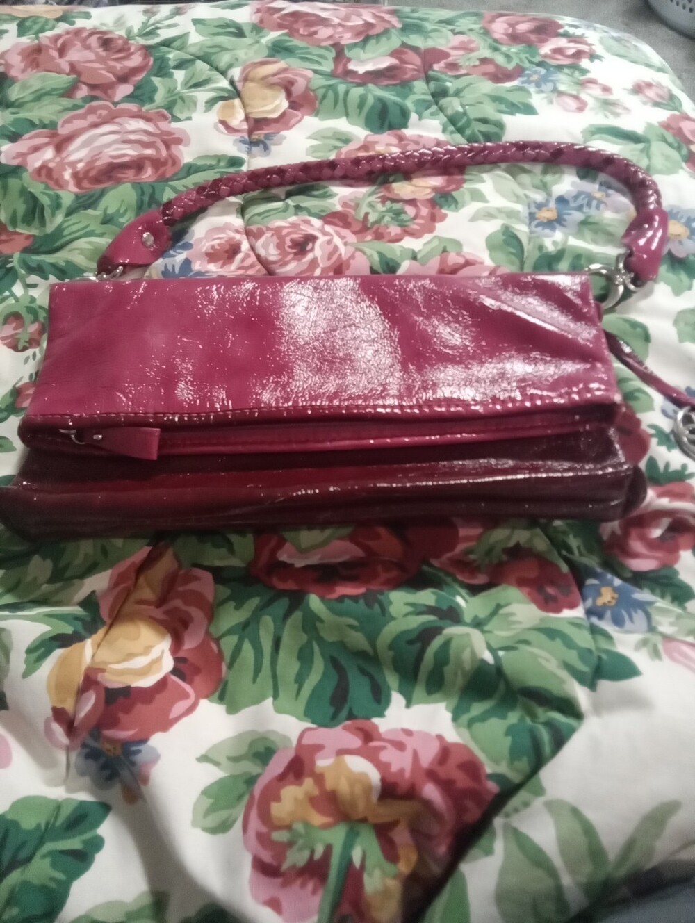 The Sak Patent Fold-Over Clutch in Berry Pink
